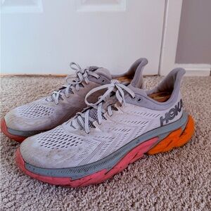Hoka Athletic Shoes in Gray with Orange and Pink Soles